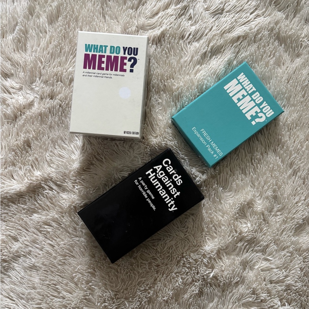 What Do You Meme? and Cards Against Humanity Game Set